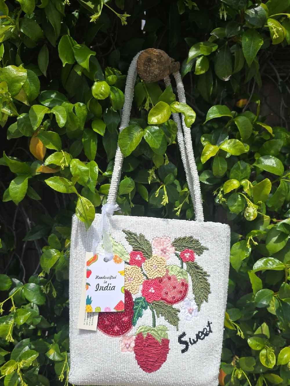 Handcrafted White Beaded Bag with Strawberry Motif